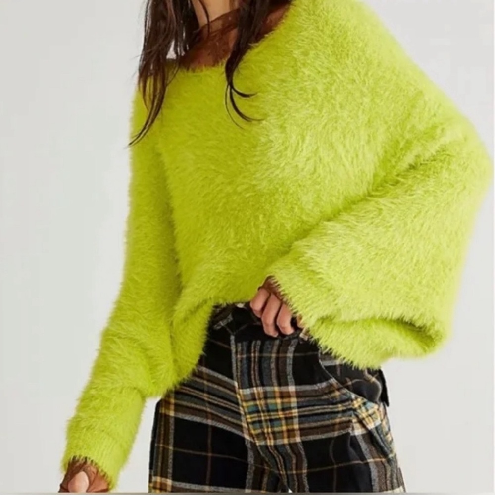 Free people one crilla pullover. New without tags never worn.